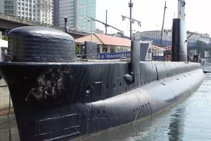 Historic submarine docked in Guanabara Bay, a highlight of the Brazil Imperial Rio tour on Fiscal Island.