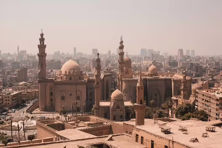Panoramic view of Sultan Hassan and Al-Rifai mosques in Islamic Cairo, Egypt, on historic mosque tour