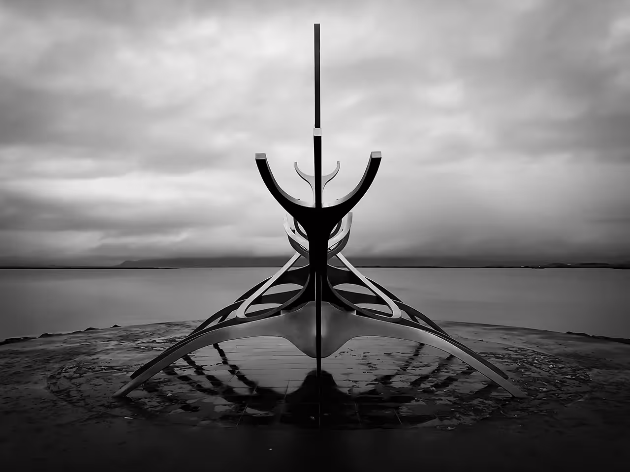 Dramatic black and white Sun Voyager sculpture in Reykjavik Iceland perfect starting point for private northern lights tour