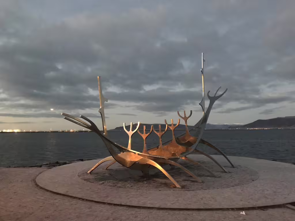 Sun Voyager Viking ship sculpture on Reykjavik waterfront at dusk, Iceland winter evening