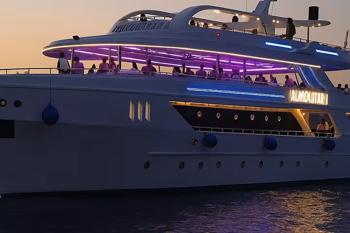 Sunset dinner cruise yacht in Sharm El Sheikh with LED lights, onboard oriental show and belly dance
