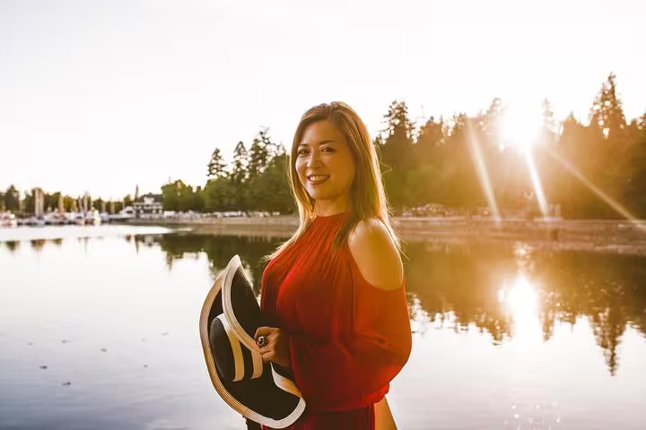 Sunset portrait at Vancouver waterfront marina, solo traveler photoshoot with personal travel photographer