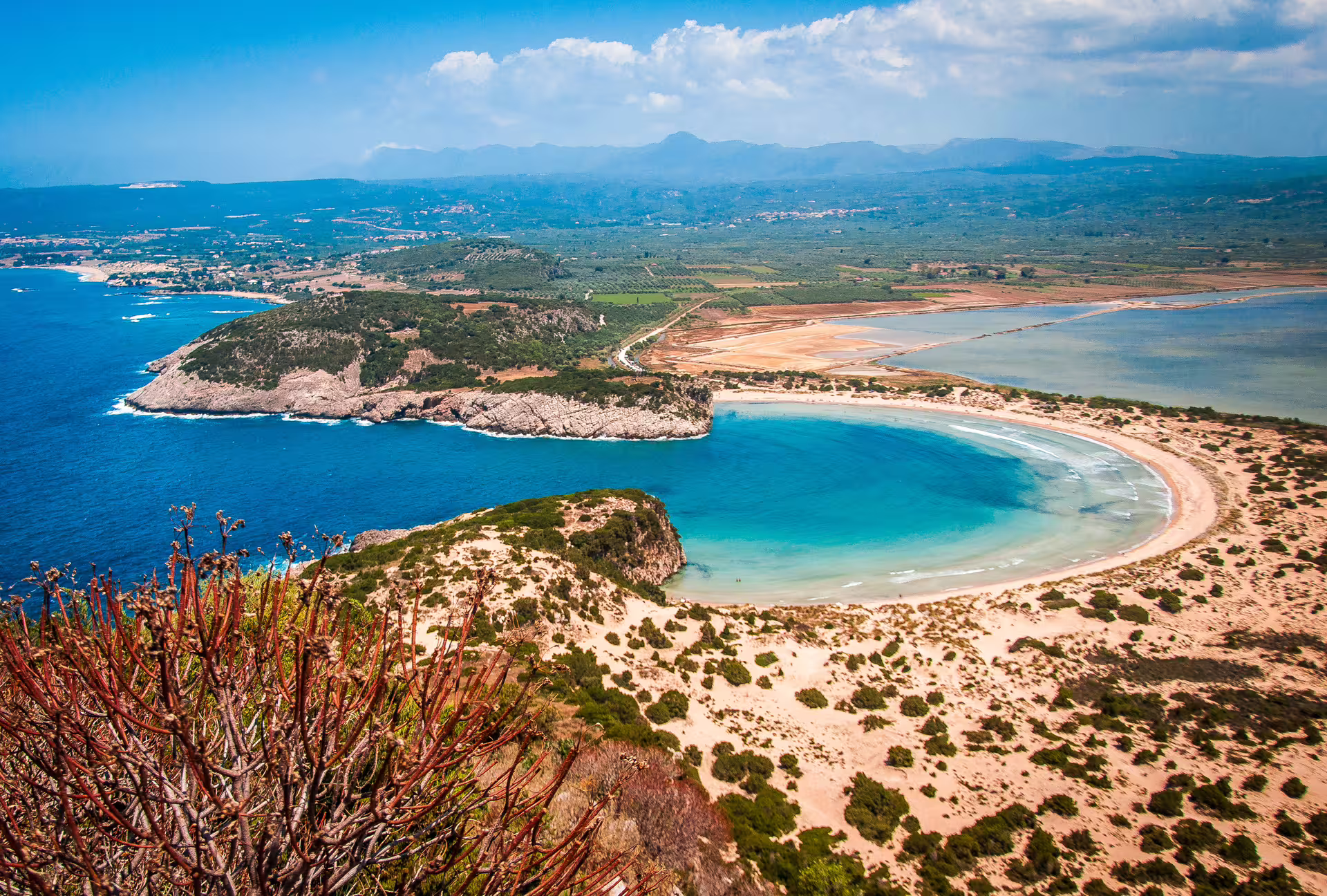 Aerial view of Voidokilia Beach, Messinia, Greece, turquoise bay and dunes near SUP paddleboarding tour
