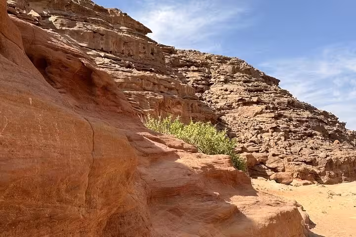 Red sandstone cliffs in the Super Colored Canyon on a jeep safari from Sharm El Sheikh to Blue Hole