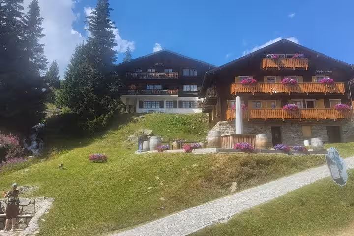 Traditional Swiss chalet in the Bernese Oberland stopover on Zurich day trip to Aletsch Glacier and Alps