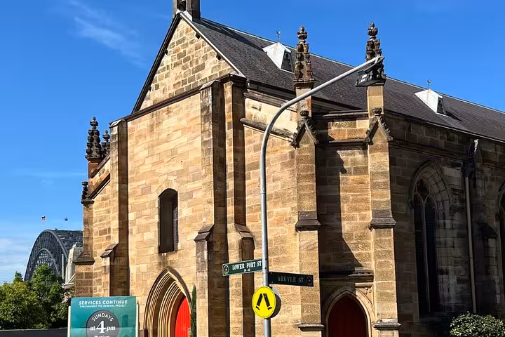 Explore Sydney's hidden gems with a walking tour featuring a historic church near the iconic Sydney Harbour Bridge.