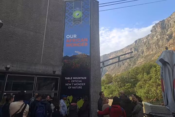 Visitors gather at the Table Mountain cable car station, a gateway to the New 7 Wonder of Nature in South Africa.