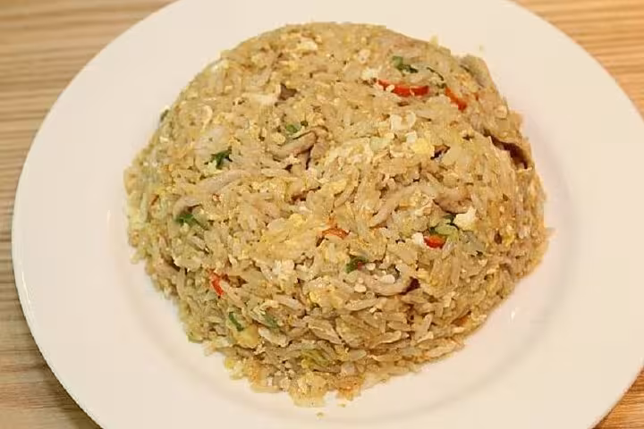 Savor flavorful fried rice with vegetables and egg at Taipei Hungzhou Xiaolongbao, offering an authentic taste of Taiwan.
