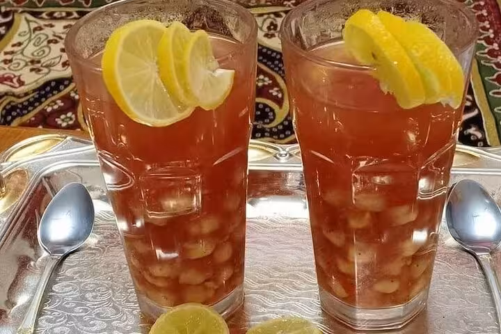 Refreshing tamarind juice with lemon slices, a classic Egyptian street drink on Islamic Cairo food tour