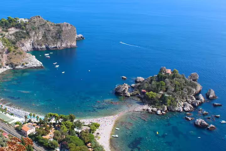 Aerial view of Isola Bella and the crystal-clear Ionian Sea near Taormina featured on a 2-hour private sightseeing tour