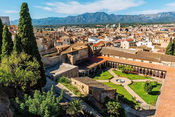 Panoramic Tarragona cityscape with historic courtyard and mountains, highlights on a self-guided scavenger hunt