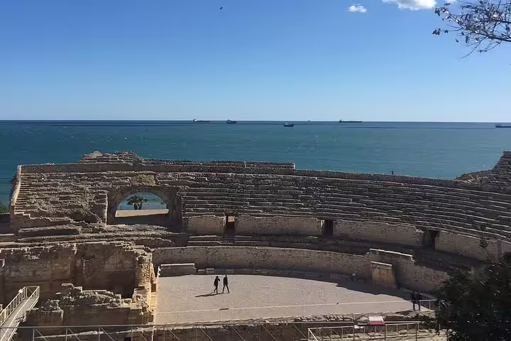 Explore Tarragona's ancient Roman amphitheater with stunning Mediterranean Sea views on a guided cultural tour.