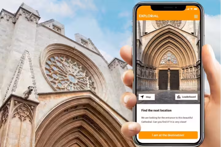 Phone app guiding a Tarragona scavenger hunt at Tarragona Cathedral, interactive self-guided city tour