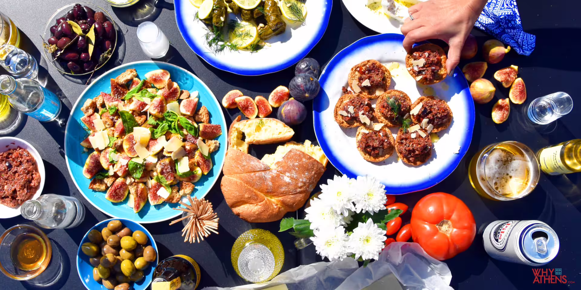 Greek meze spread with olives, figs, bread and meze bites, perfect for Taste of Athens small-group food tour