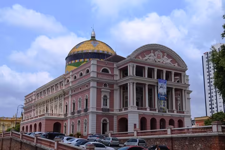 Teatro Amazonas opera house exterior in Manaus with colorful dome, a top landmark stop on a city tour