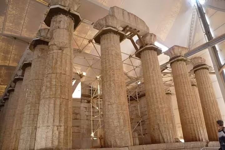 Temple of Epicurean Apollo interior with towering Doric columns on full-day private tour from Olympia