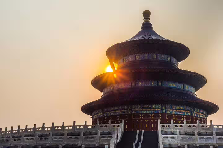 Witness the stunning Temple of Heaven at sunset, an iconic stop on the 14-day China and Yangtze River cruise tour.