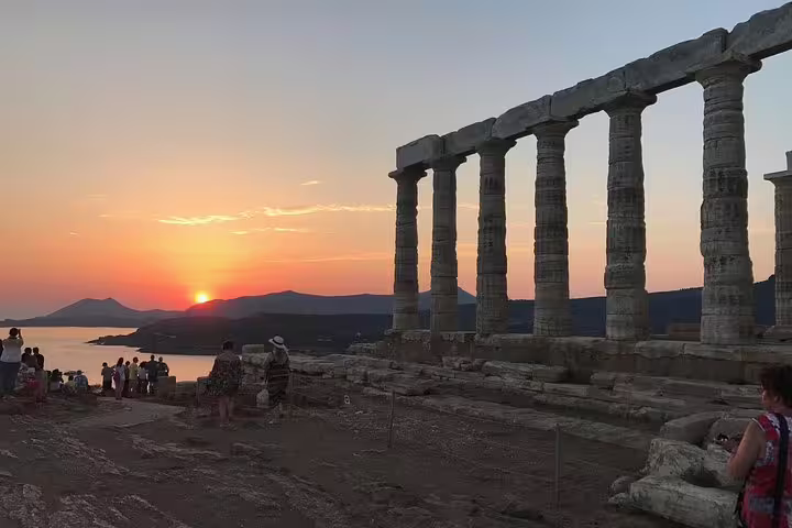 Sunset view of the Temple of Poseidon columns at Cape Sounion on a small-group half-day tour from Athens