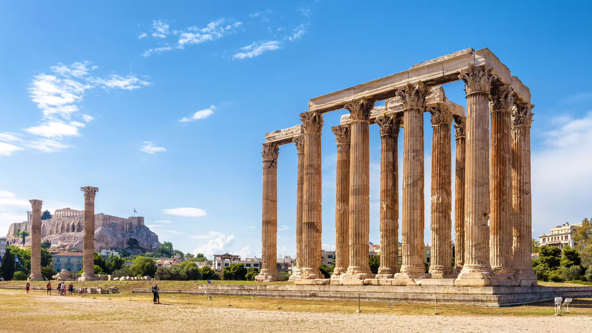 Temple of Olympian Zeus columns with Acropolis view in Athens on full-day city tour to Cape Sounion