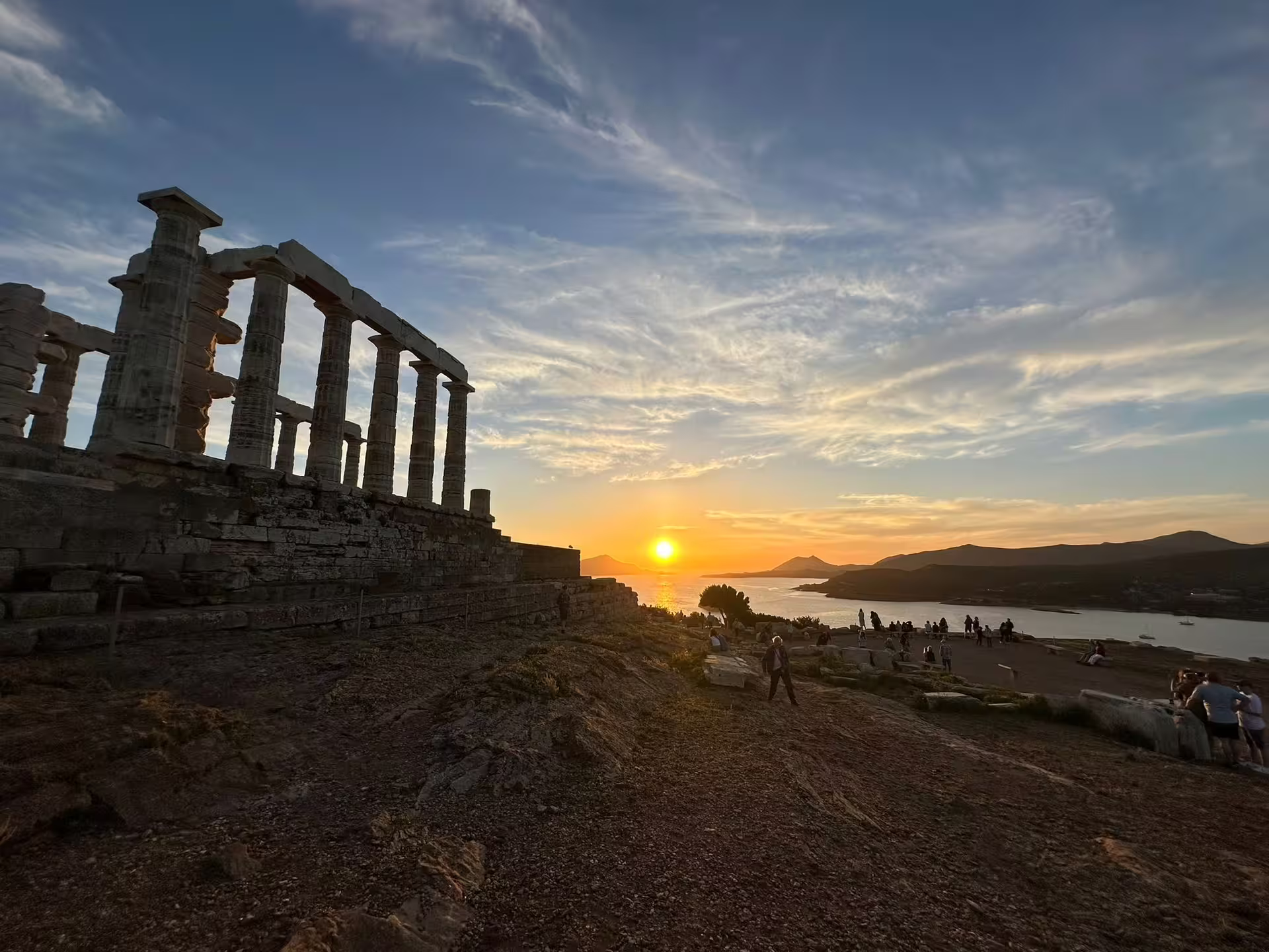 Temple of Poseidon at Cape Sounio at sunset, highlight of private 8-hour Athens panorama day tour