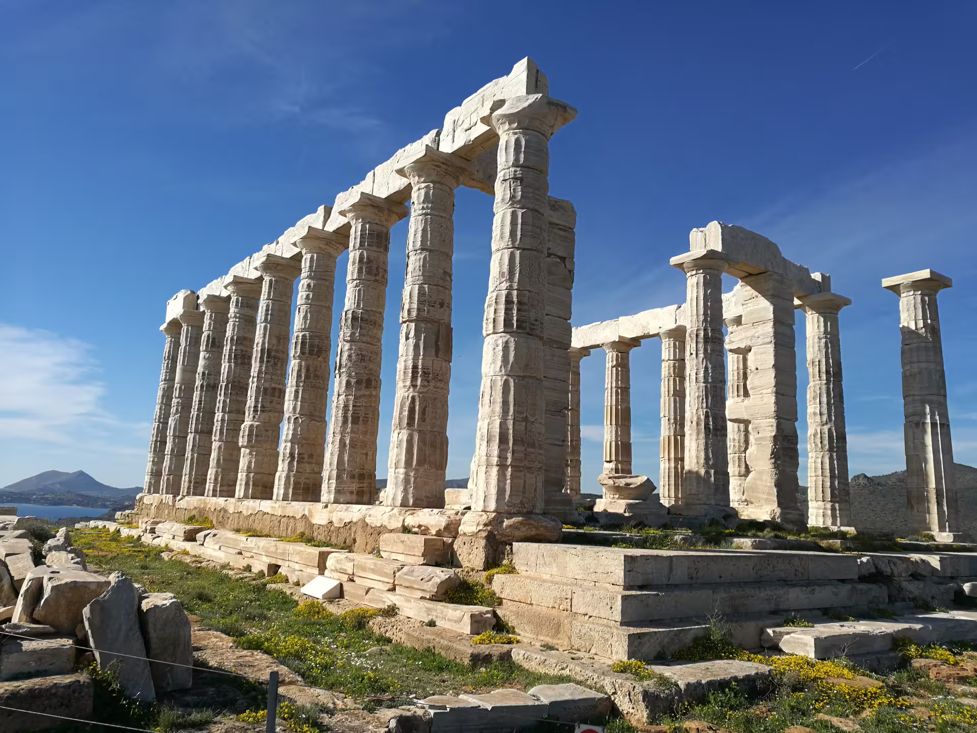 Temple of Poseidon columns at Cape Sounion on a private sunset tour along the Athens Riviera coastline