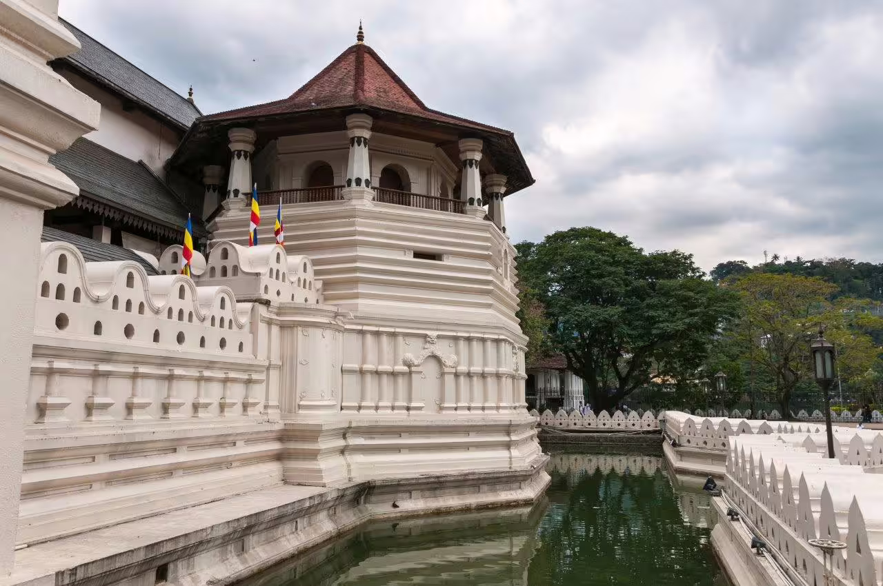 The historic Temple of the Tooth Relic in Kandy, Sri Lanka, showcasing intricate architectural details and cultural significance.