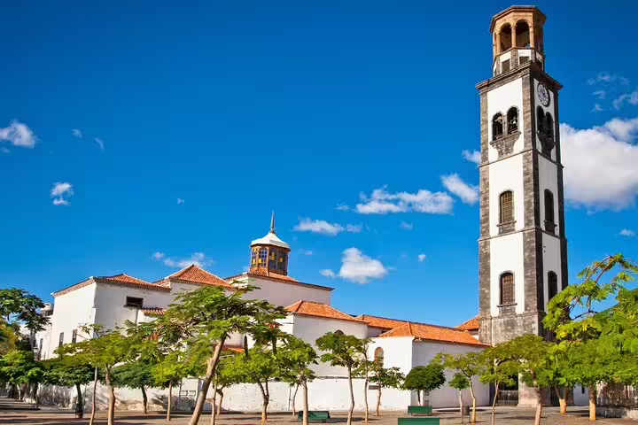 Sunny day view of a historic church tower in Tenerife, ideal for a 6-hour private tour exploration.