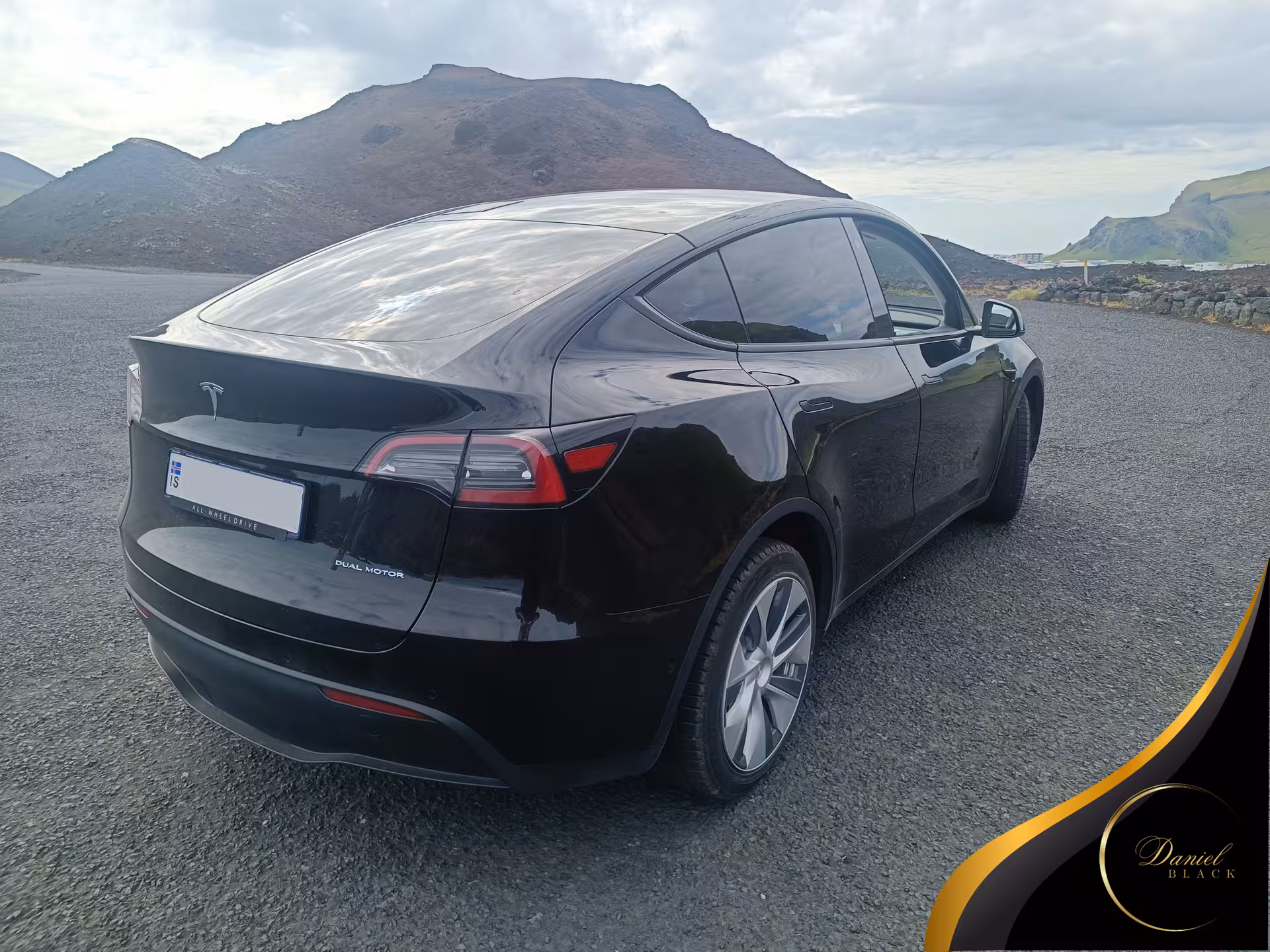 Tesla Model Y private transfer Reykjavík to Keflavík Airport KEF, premium electric ride by Iceland lava hills