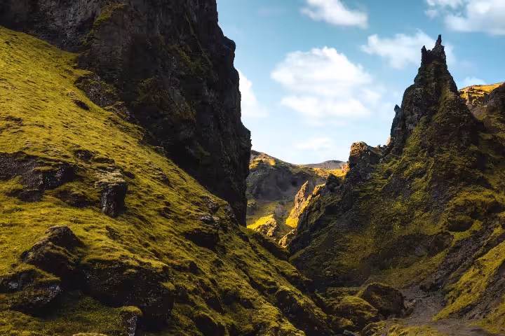 Stunning moss-covered rocky gorge of Thakgil Canyon near Vík explored on a private Iceland superjeep tour