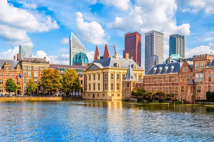 Hofvijver lake and Binnenhof skyline in The Hague, scenic stop on private Amsterdam day trip tour