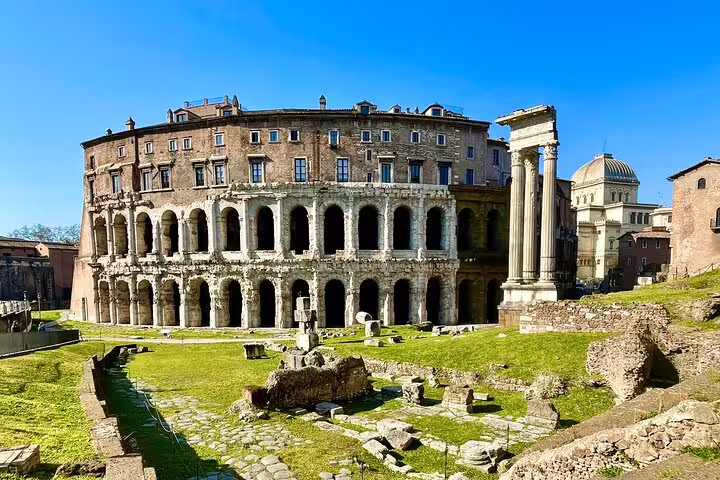 Ancient ruins and arches of the Theatre of Marcellus in Rome visited on Civitavecchia round trip with skip-the-line tickets