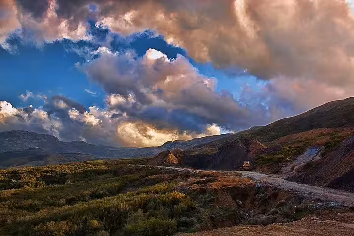 Scenic mountain road in Therisos Gorge on a private day trip from Chania to Zourva and Meskla, Crete