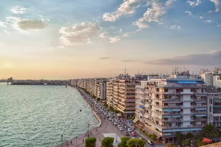 Thessaloniki waterfront promenade at sunset, arrival view for private transfer from Athens to Thessaloniki
