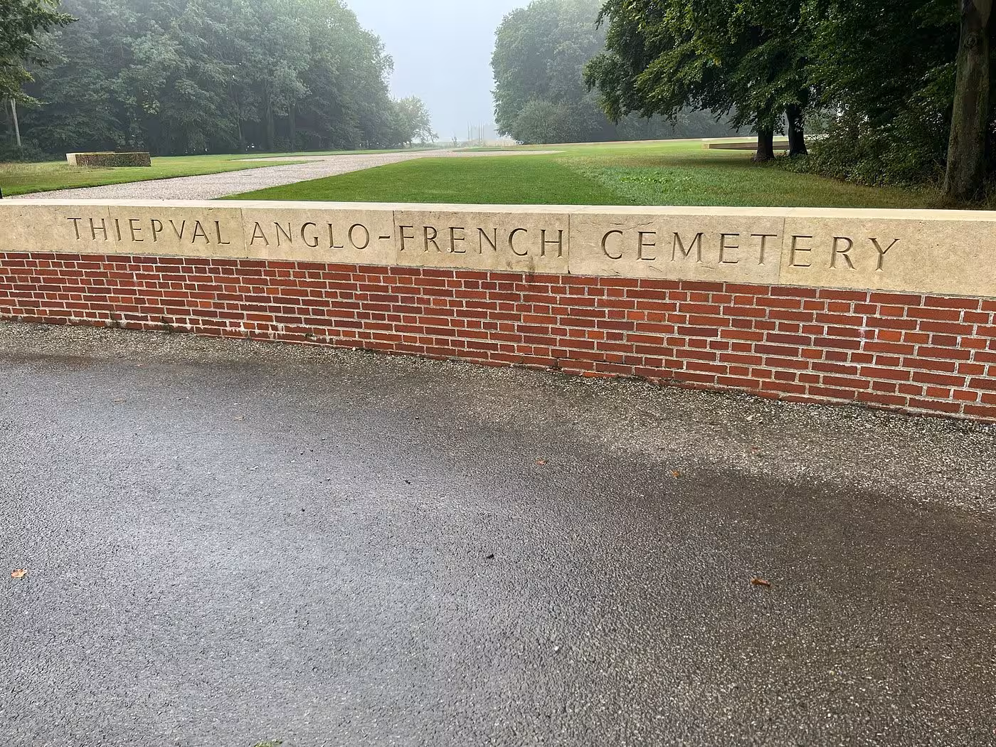 Thiepval Anglo-French Cemetery entrance wall on a misty morning, Somme Battlefields, France