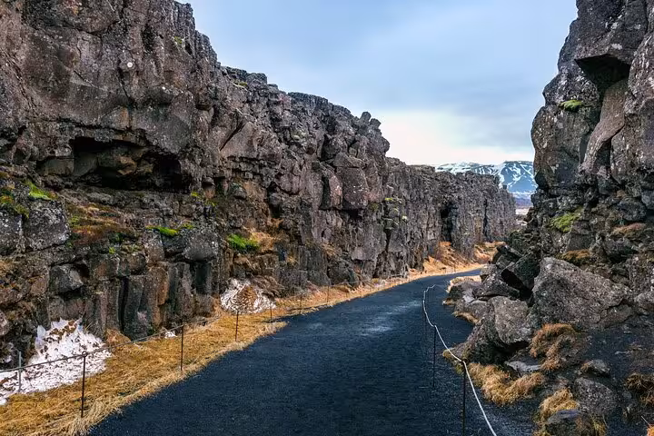 Narrow rocky canyon path through tectonic plates at Þingvellir National Park, Iceland
