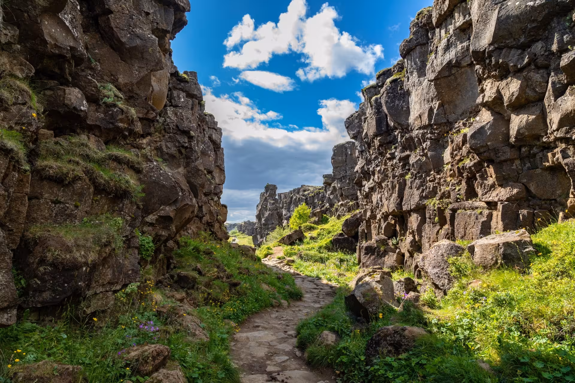 Rocky canyon path through Þingvellir tectonic plates on Iceland's Golden Circle route