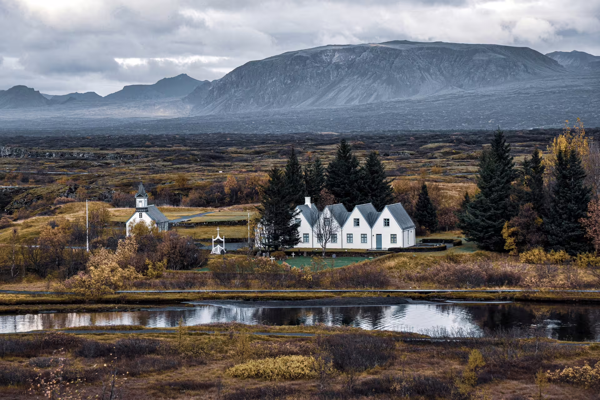 Þingvellir countryside with white church and lake views on a Private Golden Circle tour from Reykjavik, Iceland