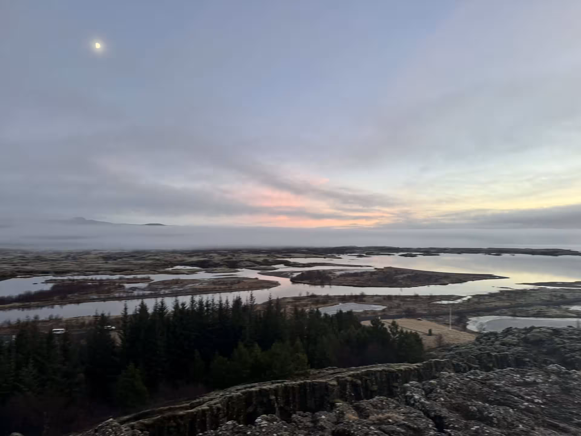 Panoramic Þingvellir National Park rift valley and lakes at dusk on Grand Golden Circle tour from Reykjavik