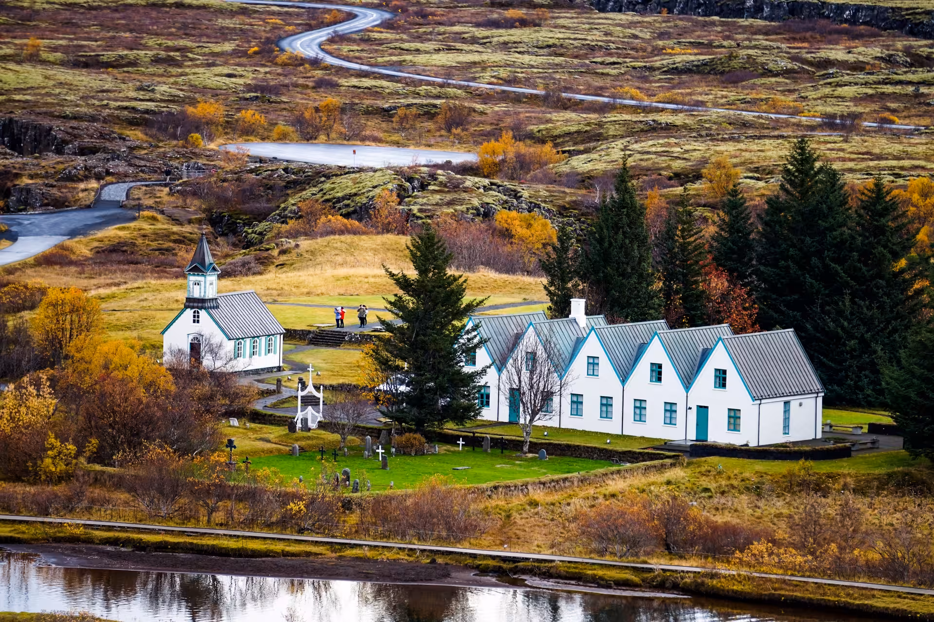 Scenic view of Þingvellir National Park landscape with historic church on Private Winter Golden Circle Tour.
