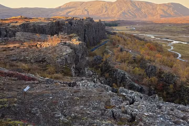 Þingvellir tectonic rift valley with winding river and mountains, Golden Circle Iceland