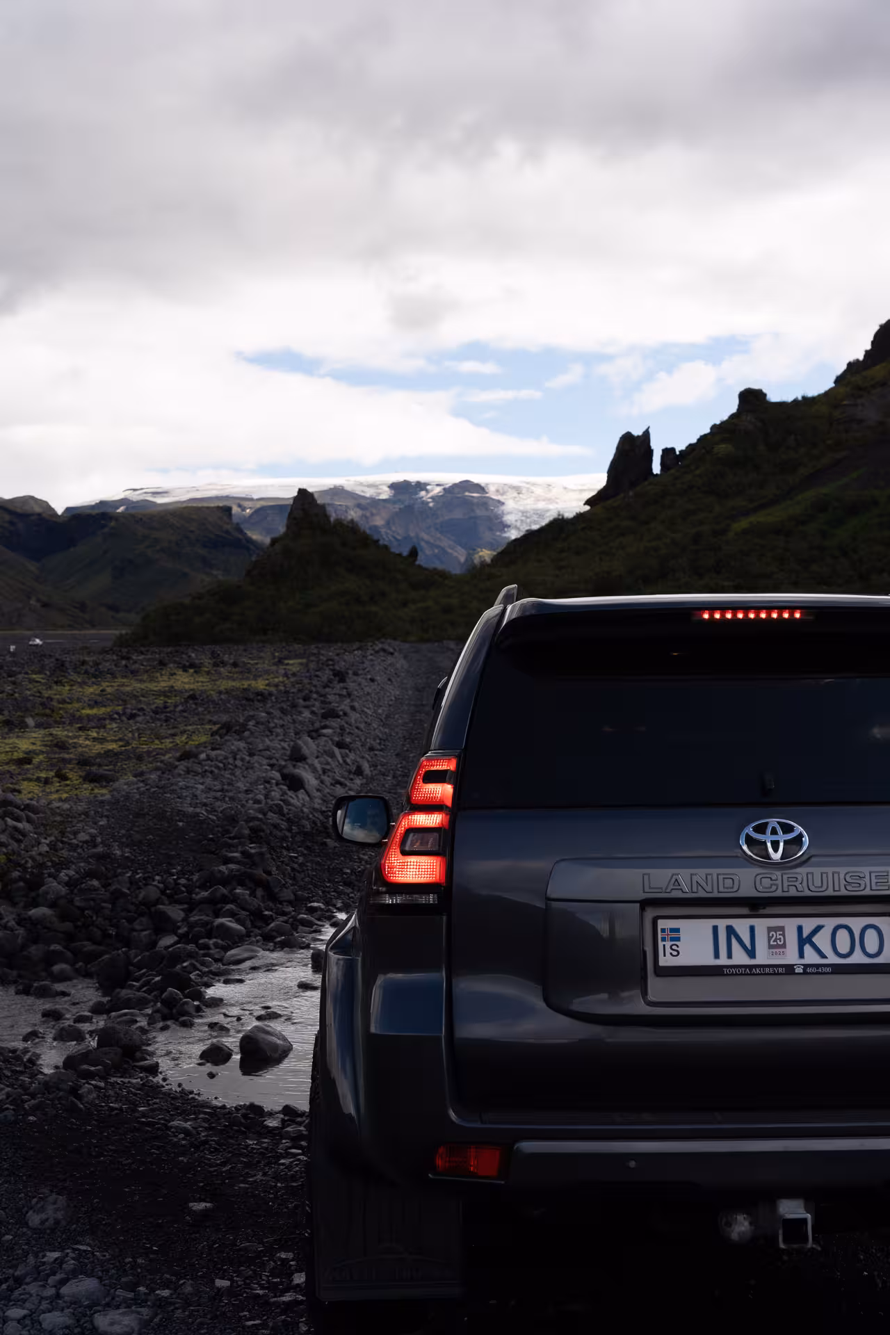4x4 Land Cruiser on Þórsmörk private off-road tour approaching a glacial river crossing on Iceland highland track
