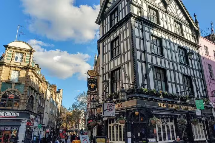The Three Greyhounds pub on Old Compton Street in London's Soho, a Tudor-style black and white timbered building
