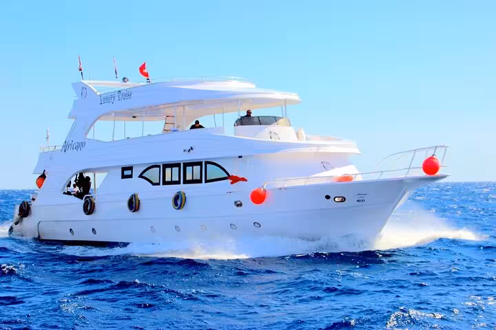 White yacht cruising the Red Sea on a Tiran Island excursion from Sharm El Sheikh with snorkeling stops