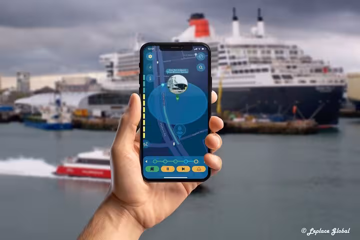 Titanic walking tour navigation app on smartphone with cruise ship at Southampton docks in background