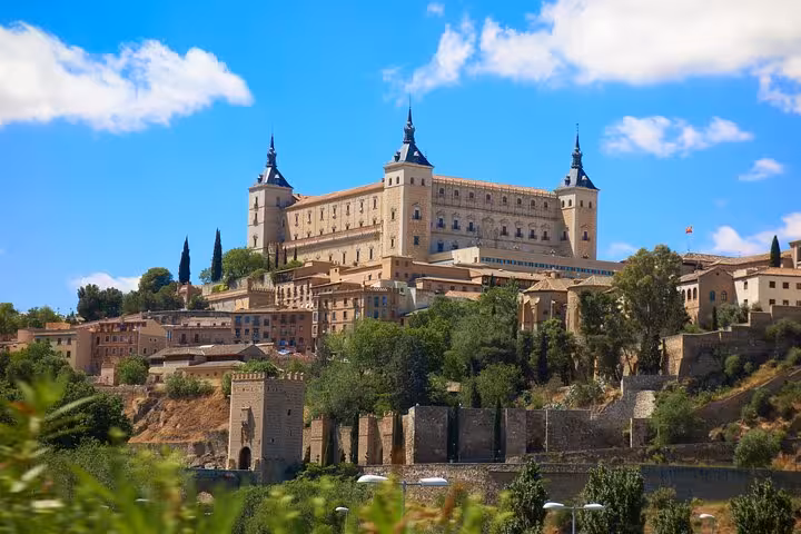 Discover Toledo's majestic Alcázar with scenic views on a private 2-hour city walk led by a local guide.