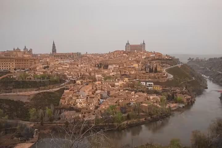 Scenic view of Toledo's historic architecture and river, featured in Lisbon to Madrid private transfer with stops in Evora and Toledo.