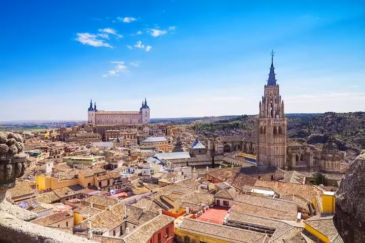Breathtaking panoramic view of Toledo's historic skyline and Alcázar, showcasing its rich cultural heritage from Madrid.