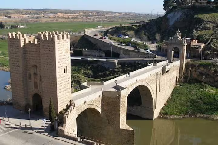 Private Mercedes minivan for Toledo tour from Madrid parked at scenic viewpoint overlooking Toledo skyline