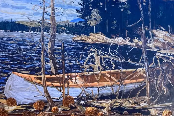 Tom Thomson inspired painting of a canoe by a rocky wilderness lake, featured in the mystery smartphone walking tour.