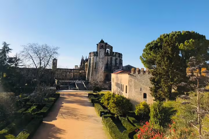 Historic Tomar Castle and Convent of Christ, a UNESCO site, showcasing Knights Templar architecture on a guided day tour.